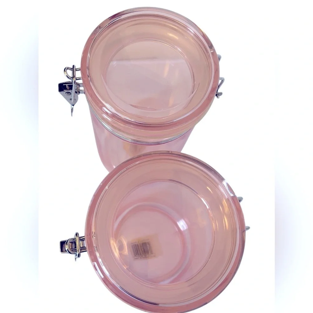 Two Vintage 85 Oz Pink Acrylic Airtight Jar Storage with Silver Clamp Closure.